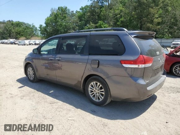 2014 Toyota Sienna XLE with VIN 5TDYK3DC6ES473747, listed as a Copart auction lot 53828345 with 251,390 mi miles and Clean Title. Bid and sale history available at carsss.com. Image 2.