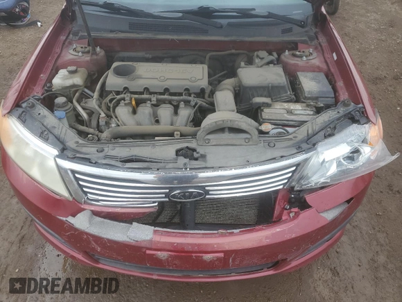 2009 Kia Optima LX z VIN KNAGE228395313765, wystawiony jako Copart lot #59707675 z przebiegiem 170 773 mil mil oraz Szkoda całkowita • Salvage title. Historia ofert i sprzedaży dostępna na DreamBid. Obrazek 11.