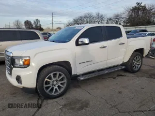 2021 GMC Canyon 4WD Denali z VIN 1GTG6EENXM1159204, wystawiony jako Copart lot #85092354 z przebiegiem 113 372 mil mil oraz Szkoda całkowita • Salvage title. Historia ofert i sprzedaży dostępna na DreamBid. Obrazek 1.