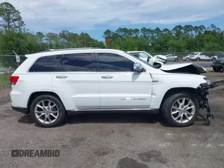 2014 Jeep Grand Cherokee Summit with VIN 1C4RJFJT6EC281114, listed as a IAAI auction lot 42497582 with 128,181 mi miles and . Bid and sale history available at DreamBid. Image 13.