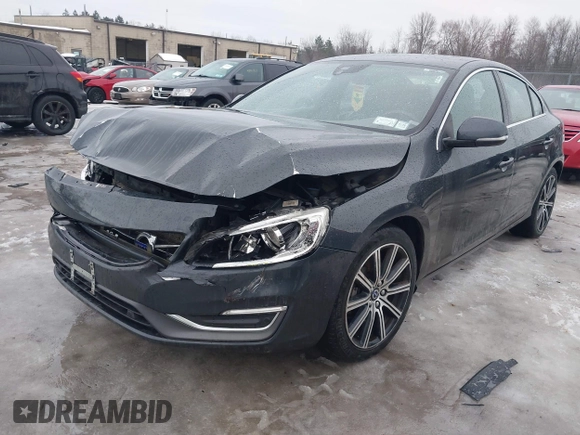 2015 Volvo S60 T5 Premier z VIN YV1612TK3F1359338, wystawiony jako IAAI lot #41645209 z przebiegiem 106 822 mil mil oraz . Historia ofert i sprzedaży dostępna na DreamBid. Obrazek 17.