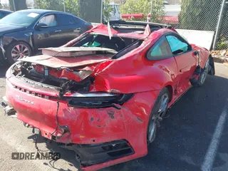 2023 Porsche 911 Carrera S with VIN WP0AB2A96PS221950, listed as a IAAI auction lot 38458821 with 1 mi miles. Bid and sale history available at carsss.com. Image 4.