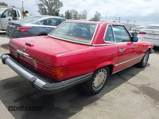 1988 Mercedes-Benz 560 with VIN WDBBA48D4JA090929, listed as a IAAI auction lot 42127701 with 186,443 mi miles. Bid and sale history available at carsss.com. Image 4.