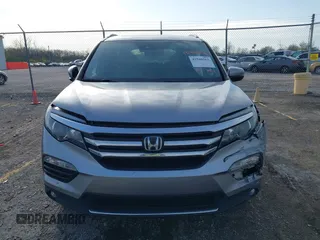 2016 Honda Pilot Touring with VIN 5FNYF6H90GB024902, listed as a IAAI auction lot 41948563 with 148,598 mi miles. Bid and sale history available at carsss.com. Image 12.