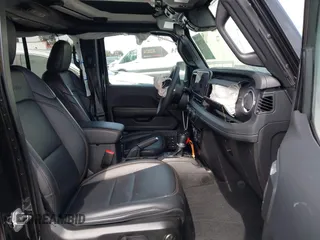 2024 Jeep Wrangler Sahara z VIN 1C4RJXP63RW192404, wystawiony jako IAAI lot #41720108 z przebiegiem 11 880 mil mil oraz . Historia ofert i sprzedaży dostępna na DreamBid. Obrazek 5.