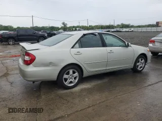 2004 Toyota Camry LE z VIN JTDBE32K940297754, wystawiony jako Copart lot #55809155 z przebiegiem 232 092 mil mil oraz Szkoda całkowita • Salvage title. Historia ofert i sprzedaży dostępna na DreamBid. Obrazek 3.
