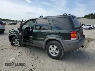2001 Ford Escape XLT with VIN 1FMCU04181KF62444, listed as a Copart auction lot 55272615 with 265,129 mi miles and Salvage title. Bid and sale history available at DreamBid. Image 2.