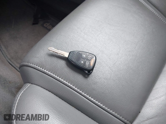 2007 Jeep Commander Sport z VIN 1J8HG48K47C546586, wystawiony jako IAAI lot #42399660 z przebiegiem 147 897 mil mil oraz . Historia ofert i sprzedaży dostępna na DreamBid. Obrazek 11.