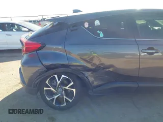 2019 Toyota C-HR XLE with VIN JTNKHMBX1K1062180, listed as a IAAI auction lot 41769979 with 75,159 mi miles. Bid and sale history available at carsss.com. Image 6.