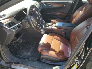 2016 Cadillac XTS Luxury Collection with VIN 2G61N5S37G9197536, listed as a Copart auction lot 52705785 with 143,434 mi miles and Salvage title. Bid and sale history available at DreamBid. Image 7.