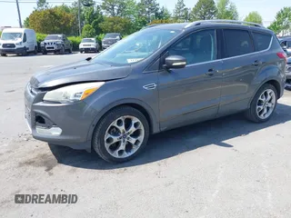 2015 Ford Escape Titanium with VIN 1FMCU0J94FUB24350, listed as a IAAI auction lot 42065641 with 168,215 mi miles. Bid and sale history available at carsss.com. Image 17.