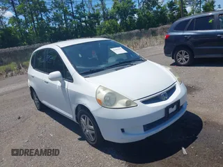 2007 Honda Fit z VIN JHMGD38437S011129, wystawiony jako IAAI lot #42581199 z przebiegiem 193 482 mil mil oraz . Historia ofert i sprzedaży dostępna na DreamBid. Obrazek 1.