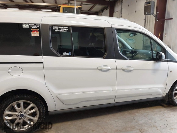 2015 Ford Transit Connect XLT z VIN NM0GS9F71F1194474, wystawiony jako IAAI lot #41666625 z przebiegiem 111 224 mil mil oraz . Historia ofert i sprzedaży dostępna na DreamBid. Obrazek 14.