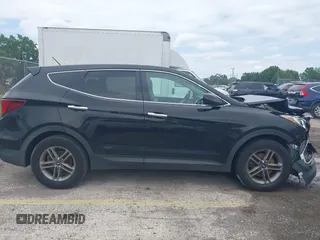 2018 Hyundai Santa Fe 2.4L with VIN 5XYZT3LB5JG539917, listed as a IAAI auction lot 41975300 with 214,562 mi miles and . Bid and sale history available at DreamBid. Image 13.