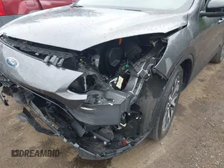 2020 Ford Escape SE Sport Hybrid with VIN 1FMCU0BZ0LUC52871, listed as a IAAI auction lot 42225741 with Not provided miles and . Bid and sale history available at DreamBid. Image 6.