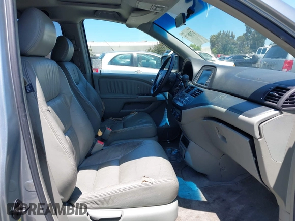 2006 Honda Odyssey EX-L z VIN 5FNRL38716B051664, wystawiony jako IAAI lot #42520320 z przebiegiem 304 835 mil mil oraz . Historia ofert i sprzedaży dostępna na DreamBid. Obrazek 5.