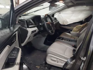 2020 Honda Odyssey Elite with VIN 5FNRL6H9XLB034814, listed as a IAAI auction lot 41940655 with 57,864 mi miles and . Bid and sale history available at DreamBid. Image 5.