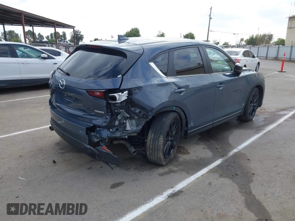 2023 Mazda CX-5 2.5 S Preferred Package with VIN JM3KFBCM0P0255265, listed as a IAAI auction lot 42066175 with 43,213 mi miles. Bid and sale history available at carsss.com. Image 4.