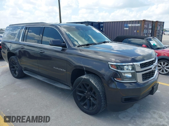 2015 Chevrolet Suburban LT z VIN 1GNSKJKC9FR245097, wystawiony jako IAAI lot #42468168 z przebiegiem 198 454 mil mil oraz . Historia ofert i sprzedaży dostępna na DreamBid. Obrazek 1.