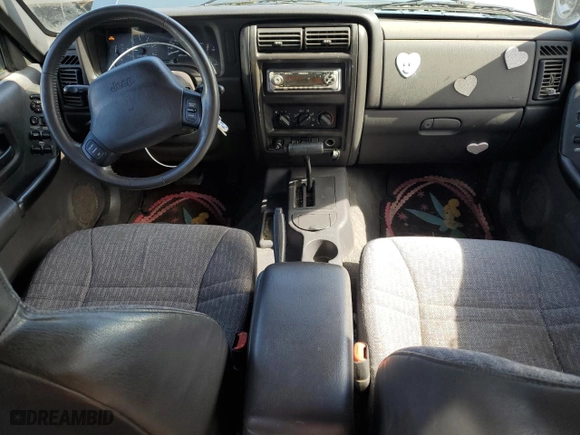 1999 Jeep Cherokee Sport with VIN 1J4FT68S3XL577599, listed as a Copart auction lot 50081715 with 182,974 mi miles and Clean Title. Bid and sale history available at carsss.com. Image 8.