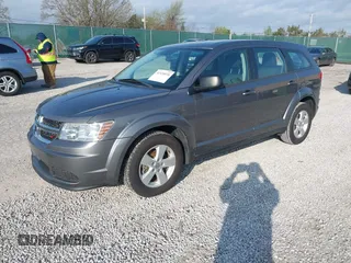2013 Dodge Journey American Value with VIN 3C4PDCAB2DT501243, listed as a IAAI auction lot 41928930 with 147,437 mi miles and . Bid and sale history available at DreamBid. Image 2.