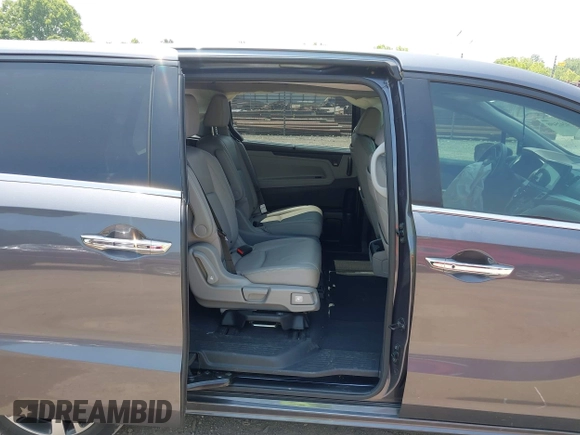 2022 Honda Odyssey Touring z VIN 5FNRL6H83NB023583, wystawiony jako IAAI lot #42425498 z przebiegiem Nie podano mil oraz . Historia ofert i sprzedaży dostępna na DreamBid. Obrazek 8.