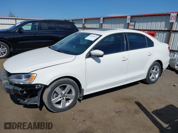 2012 Volkswagen Jetta TDI w/Premium & Nav with VIN 3VWLL7AJXCM426846, listed as a IAAI auction lot 42492125 with 127,342 mi miles and . Bid and sale history available at DreamBid. Image 2.