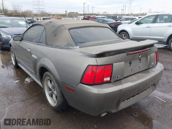 2002 Ford Mustang GT Deluxe z VIN 1FAFP45X32F169177, wystawiony jako IAAI lot #41880690 z przebiegiem 107 284 mil mil oraz . Historia ofert i sprzedaży dostępna na DreamBid. Obrazek 3.