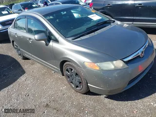 2006 Honda Civic Sdn LX with VIN 1HGFA16516L060197, listed as a IAAI auction lot 41855242 with 204,499 mi miles. Bid and sale history available at carsss.com. Image 1.