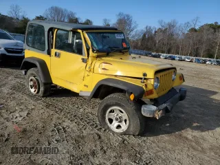 2001 Jeep Wrangler Sport with VIN 1J4FA49S21P312522, listed as a Copart auction lot 54698935 with 201,199 mi miles and Salvage Title. Bid and sale history available at carsss.com. Image 4.