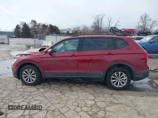 2018 Volkswagen Tiguan S with VIN 3VV1B7AX9JM085312, listed as a IAAI auction lot 41656827 with 122,322 mi miles and . Bid and sale history available at DreamBid. Image 14.