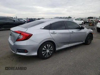 2019 Honda Civic Sedan LX with VIN 19XFC2F61KE200100, listed as a Copart auction lot 37959484 with 131,847 mi miles and Salvage Title. Bid and sale history available at carsss.com. Image 3.