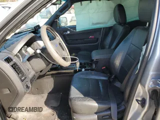 2010 Ford Escape Limited with VIN 1FMCU0E71AKC71285, listed as a Copart auction lot 61344164 with 163,471 mi miles and Salvage title. Bid and sale history available at DreamBid. Image 7.