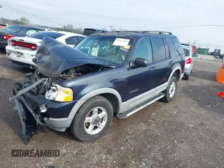 2002 Ford Explorer XLT with VIN 1FMDU63E82UA70806, listed as a IAAI auction lot 41937613 with 296,274 mi miles and . Bid and sale history available at DreamBid. Image 2.