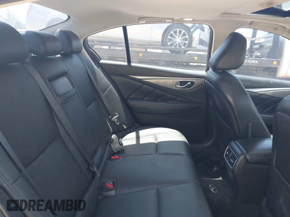 2015 Infiniti Q50 Sport with VIN JN1BV7AR2FM410593, listed as a IAAI auction lot 42346780 with 157,027 mi miles and . Bid and sale history available at DreamBid. Image 8.