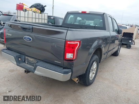 2015 Ford F-150 XL with VIN 1FTEX1CF6FKF02242, listed as a IAAI auction lot 41478528 with 144,197 mi miles. Bid and sale history available at carsss.com. Image 4.