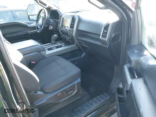 2015 Ford F-150 XLT w/HD Payload Pkg with VIN 1FTFW1EG5FFC13942, listed as a IAAI auction lot 41392709 with 196,416 mi miles. Bid and sale history available at carsss.com. Image 5.