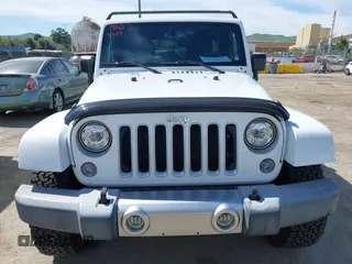 2017 Jeep Wrangler Unlimited Sahara with VIN 1C4BJWEG5HL588535, listed as a IAAI auction lot 42013571 with 70,012 mi miles. Bid and sale history available at carsss.com. Image 13.