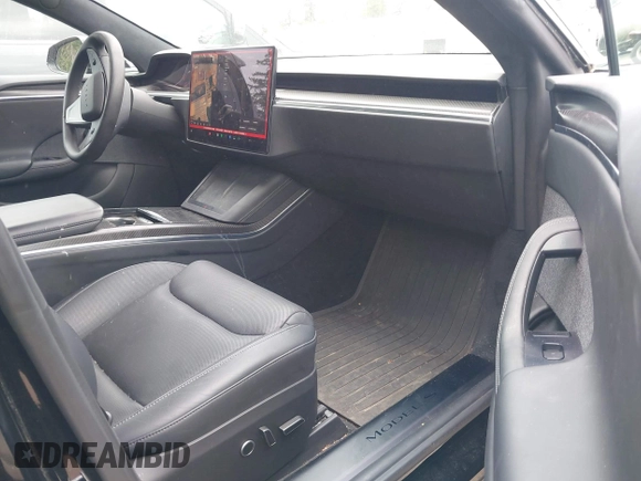 2021 Tesla Model S Plaid with VIN 5YJSA1E62MF447509, listed as a IAAI auction lot 42509281 with 32,372 mi miles and . Bid and sale history available at DreamBid. Image 5.