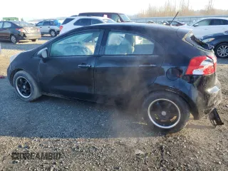 2014 Kia Rio LX with VIN KNADM5A39E6358548, listed as a Copart auction lot 83212984 with 132,272 mi miles and Salvage Title. Bid and sale history available at carsss.com. Image 2.