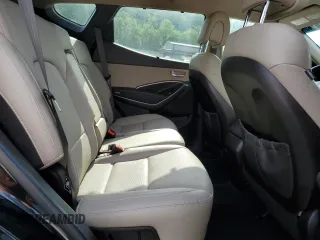 2017 Hyundai Santa Fe 2.4L z VIN 5XYZUDLB1HG412675, wystawiony jako Copart lot #57169045 z przebiegiem 38 947 mil mil oraz Szkoda całkowita • Salvage title. Historia ofert i sprzedaży dostępna na DreamBid. Obrazek 11.