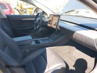 2022 Tesla Model 3 Long Range with VIN 5YJ3E1EB3NF290550, listed as a IAAI auction lot 41826287 with 67,648 mi miles and . Bid and sale history available at DreamBid. Image 5.