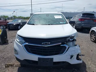 2020 Chevrolet Equinox LS z VIN 3GNAXHEV5LS515051, wystawiony jako IAAI lot #42306780 z przebiegiem 144 598 mil mil oraz . Historia ofert i sprzedaży dostępna na DreamBid. Obrazek 12.