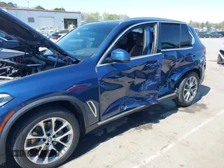 2021 BMW X5 sDrive40i with VIN 5UXCR4C03M9F14479, listed as a IAAI auction lot 41884878 with 1 mi miles. Bid and sale history available at carsss.com. Image 6.