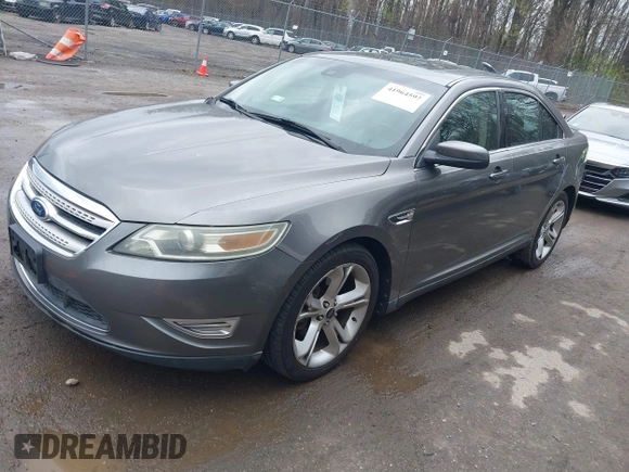 2011 Ford Taurus SHO with VIN 1FAHP2KT8BG100347, listed as a IAAI auction lot 41964597 with 104,603 mi miles and . Bid and sale history available at DreamBid. Image 2.
