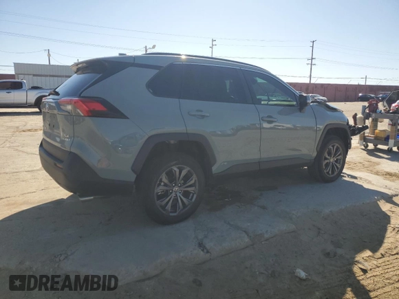 2022 Toyota RAV4 Hybrid XLE Premium with VIN 4T3B6RFV8NU102695, listed as a Copart auction lot 49876815 with 35,614 mi miles and Salvage title. Bid and sale history available at DreamBid. Image 3.