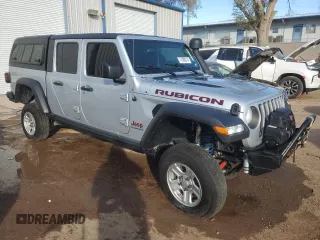 2023 Jeep Gladiator Rubicon FarOut z VIN 1C6JJTBM2PL587711, wystawiony jako Copart lot #77280214 z przebiegiem Nie podano mil oraz Szkoda całkowita • Salvage title. Historia ofert i sprzedaży dostępna na DreamBid. Obrazek 4.