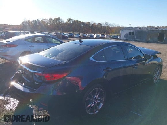 2015 Mazda 6 i Grand Touring with VIN JM1GJ1W55F1183824, listed as a IAAI auction lot 40840126 with 132,773 mi miles. Bid and sale history available at carsss.com. Image 4.