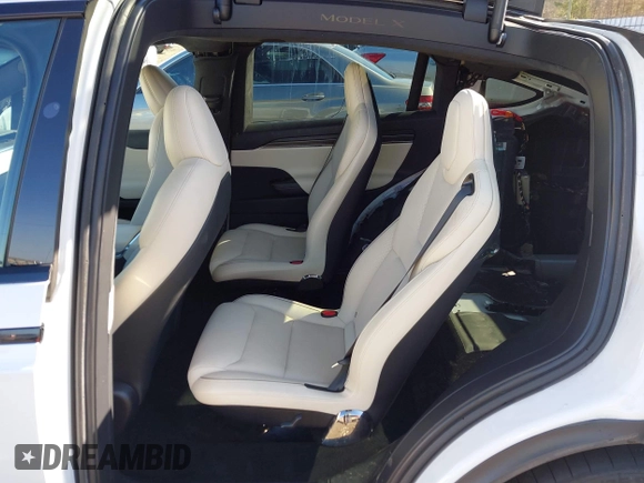 2022 Tesla Model X Plaid z VIN 7SAXCBE64NF352928, wystawiony jako IAAI lot #41406070 z przebiegiem 38 175 mil mil oraz . Historia ofert i sprzedaży dostępna na DreamBid. Obrazek 8.
