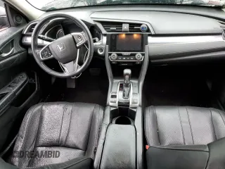 2017 Honda Civic EX-L z VIN 19XFC1F74HE209787, wystawiony jako Copart lot #56352415 z przebiegiem 130 264 mil mil oraz Szkoda całkowita • Salvage title. Historia ofert i sprzedaży dostępna na DreamBid. Obrazek 8.